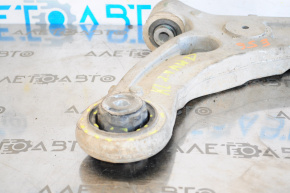 The lower front right control arm of a Jeep Cherokee KL 14-18 has a torn silent block.