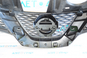 Radiator grill grill Nissan Rogue 14-15 without a chamber with an emblem, scratched chrome, broken fastener