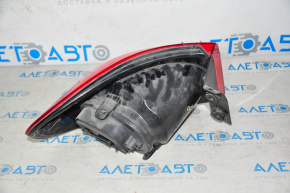 Right outer fender light for a VW Tiguan 09-11 pre-restoration, spider web on the glass