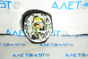 The steering wheel airbag for the driver's side of the Audi A4 B8 08-12 pre-restoration model has worn chrome and scratches.