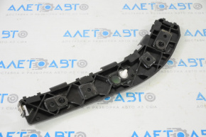 Right rear bumper mount on the wing of a 1995-1996 Ford Edge.
