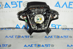 The chrome peeling off on the steering wheel airbag for the driver's side of a Ford Focus mk3 11-18