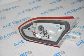 Inner taillight trunk lid left Ford Focus mk3 15-18 rest 4d chip