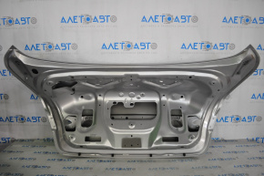 Trunk lid Infiniti Q50 14-17 silver K23, torn near the fastenings of the molding of the butt