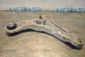 The lower front left control arm of a Jeep Cherokee KL 14-18 has a torn silent block.