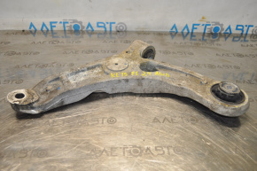 The lower front left control arm of a Jeep Cherokee KL 14-18 has a torn silent block.