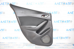 Door trim card rear left Mazda3 14-16 BM black with black insert cloth, armrest plastic, scratches