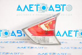 Right inner trunk lid light for a 14-16 Nissan Rogue