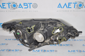 Headlight front left Nissan Rogue 14-16 bare halogen broken fastening broken housing, scratch on glass