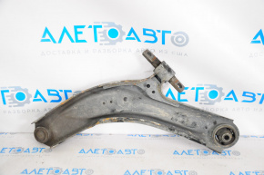 The lower front right control arm of a 14-20 Nissan Rogue has a torn silent block.