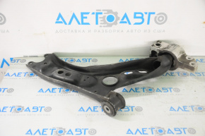 The lower front left control arm of a VW Tiguan 09-17 has a torn silent block.
