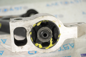 The lower front left control arm of a VW Tiguan 09-17 has a torn silent block.