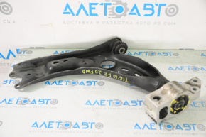 The lower front right control arm of a VW Tiguan 09-17 has a torn silent block.