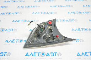 Light inside trunk lid right Nissan Rogue 14-16 cracks in glass