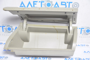 The glove compartment, glove box, upper compartment of the Toyota Prius V 12-17 beige