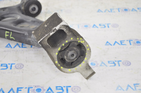 The lower front left control arm of a VW CC 08-17 has a torn silent block.