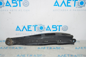 The lower rear left transverse control arm of a Subaru Outback 15-19 is dented.