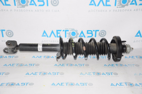 Rear left shock absorber assembly for a 1993 Honda Accord.