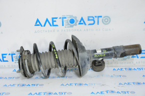 Front left shock absorber assembly for a 1993 Honda Accord.