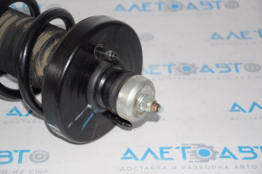 Rear left shock absorber assembly for a 1993 Honda Accord.