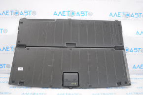 The trunk floor of the Toyota Prius V 12-14 is dark gray.