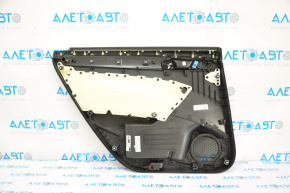 Door trim panel rear right VW Passat b7 12-15 USA black with black plastic insert, leather armrest, molding gray gloss