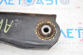 The lower rear right control arm of a Dodge Journey 11-20 has a torn silent block.