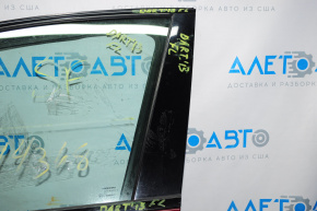 Front left side door trim for a 1993 Dodge Dart