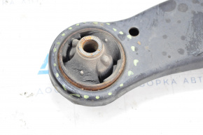 The lower front right control arm of a Lexus RX350 RX450h 10-15 has a torn silent block.
