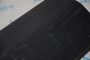 The trunk opening trim of the Dodge Dart 13-16 is scuffed, scuffed