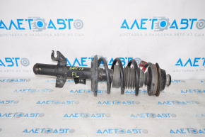 Front left shock absorber assembly for a 1993 Dodge Dart.