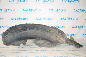 The rear left fender liner of a Subaru Outback 15-16 is torn.
