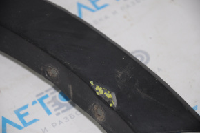 Front left wing arch trim Ford Explorer 11-15 pre-restoration, scuffing, broken guide, broken fastener