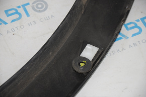 Front left wing arch trim Ford Explorer 11-15 pre-restoration, scuffing, broken guide, broken fastener