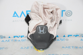 The airbag in the driver's steering wheel of a Honda CRV 12-14 exploded.