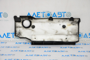 The Toyota Camry V40 hybrid engine cover has a painted inscription.