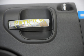 Door trim card rear left Jeep Patriot 11-17 plastic and leather, black, scratches near the handle