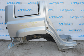Quarter wing rear right Jeep Patriot 11-17 silver, body ventilation hole is dented