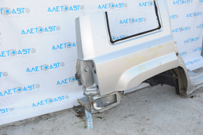 Quarter wing rear right Jeep Patriot 11-17 silver, body ventilation hole is dented