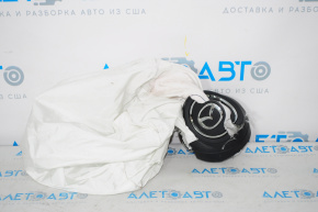 The airbag in the driver's steering wheel of the Mazda CX-9 16-23 exploded.