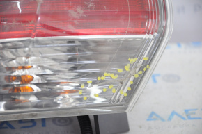 Light outer wing left Nissan Rogue 14-16 crack