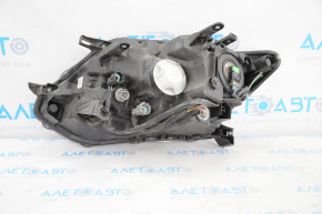 Headlight front right Nissan Rogue 14-16 bare halogen, crack