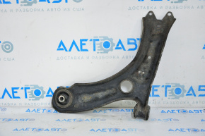The lower front right control arm of a VW Jetta 11-18 USA has a torn silent block.