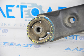 The lower front right control arm of a Hyundai Santa FE Sport 13-18 is missing a ball joint and has a torn silent block.