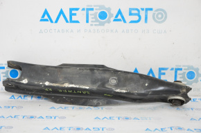 Lower control arm under the rear right spring Hyundai Santa FE Sport 13-18 FWD