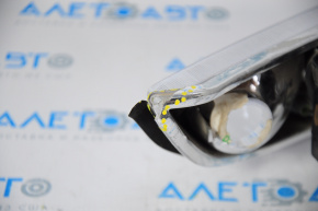 Left front headlight for a Saturn S-series coupe (97-00), halogen, missing chrome, scratches