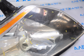 Nissan 350z 2005 front right headlight, bare xenon, broken mounts, crack, scratches, no covers
