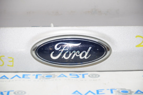 Upper trunk door molding with emblem Ford Escape MK3 13-16 pre-restoration under camera emblem defect