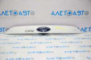 Upper trunk door molding with emblem Ford Escape MK3 13-16 pre-restoration under camera emblem defect