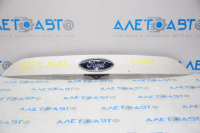 Upper trunk door molding with emblem Ford Escape MK3 13-16 pre-restoration under camera emblem defect
